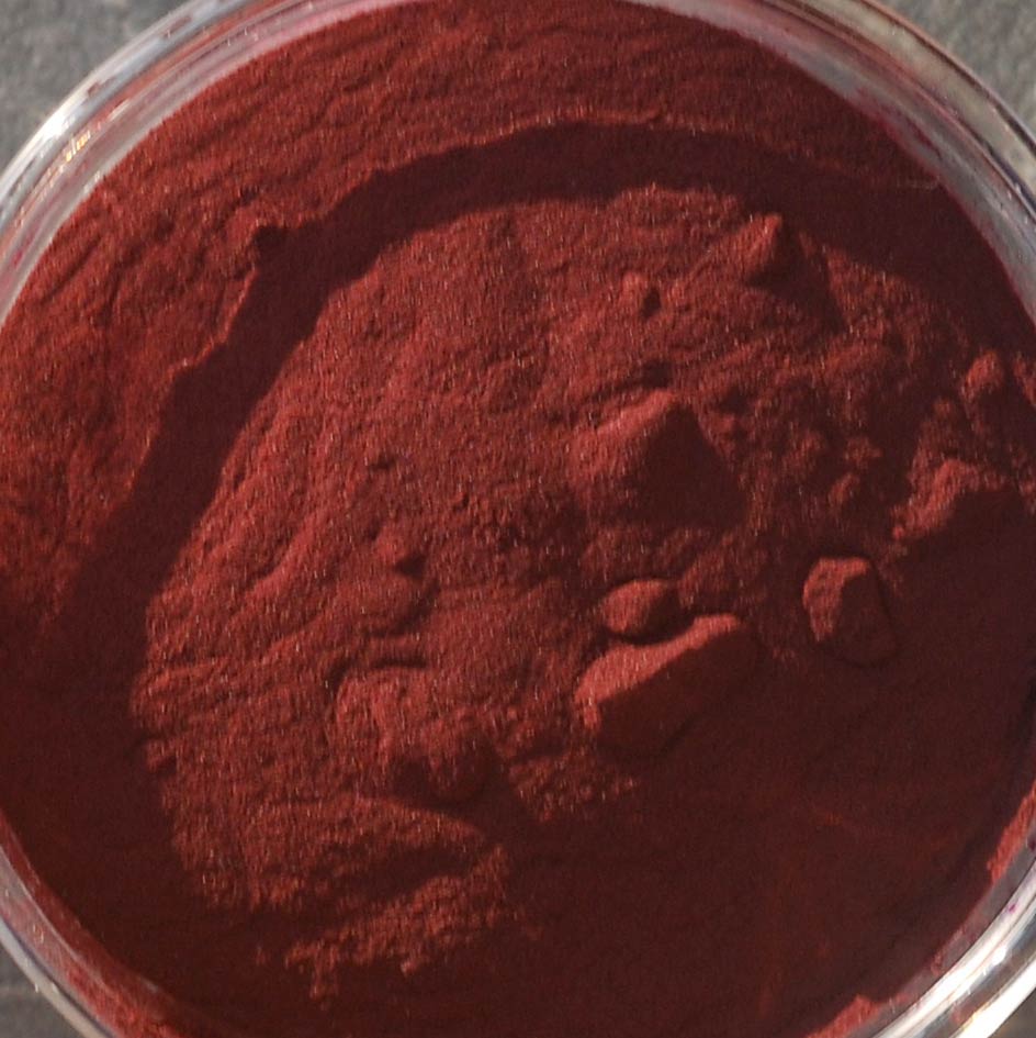 Spirulina Powder – 200 g Fine red spirulina powder in a glass container, 200 g.