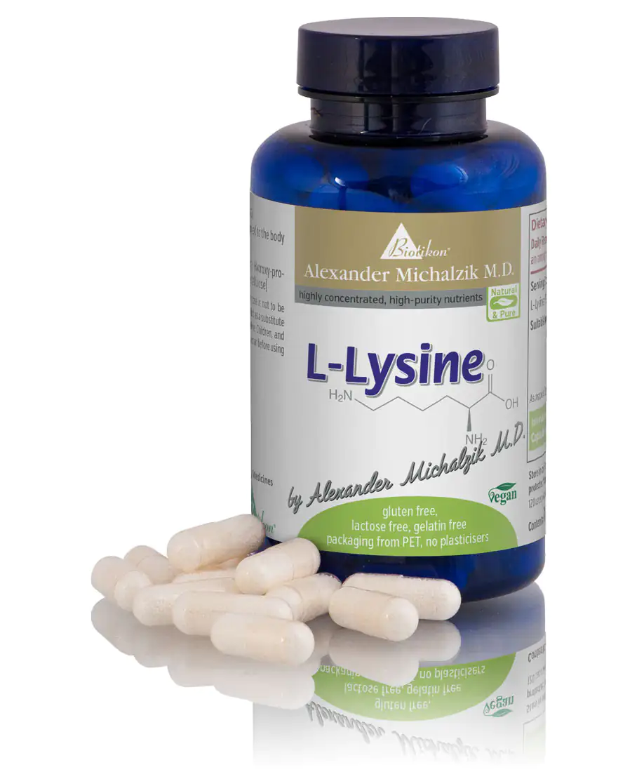 L-Lysine 500 mg - Capsules Glass bottle with L-Lysine capsules, 500 mg, transparent capsules lying on a table.