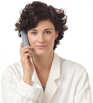 Doctor-Patient Collaboration - Phone Call Smiling woman with curly hair in a white coat on the phone, portrait shot.
