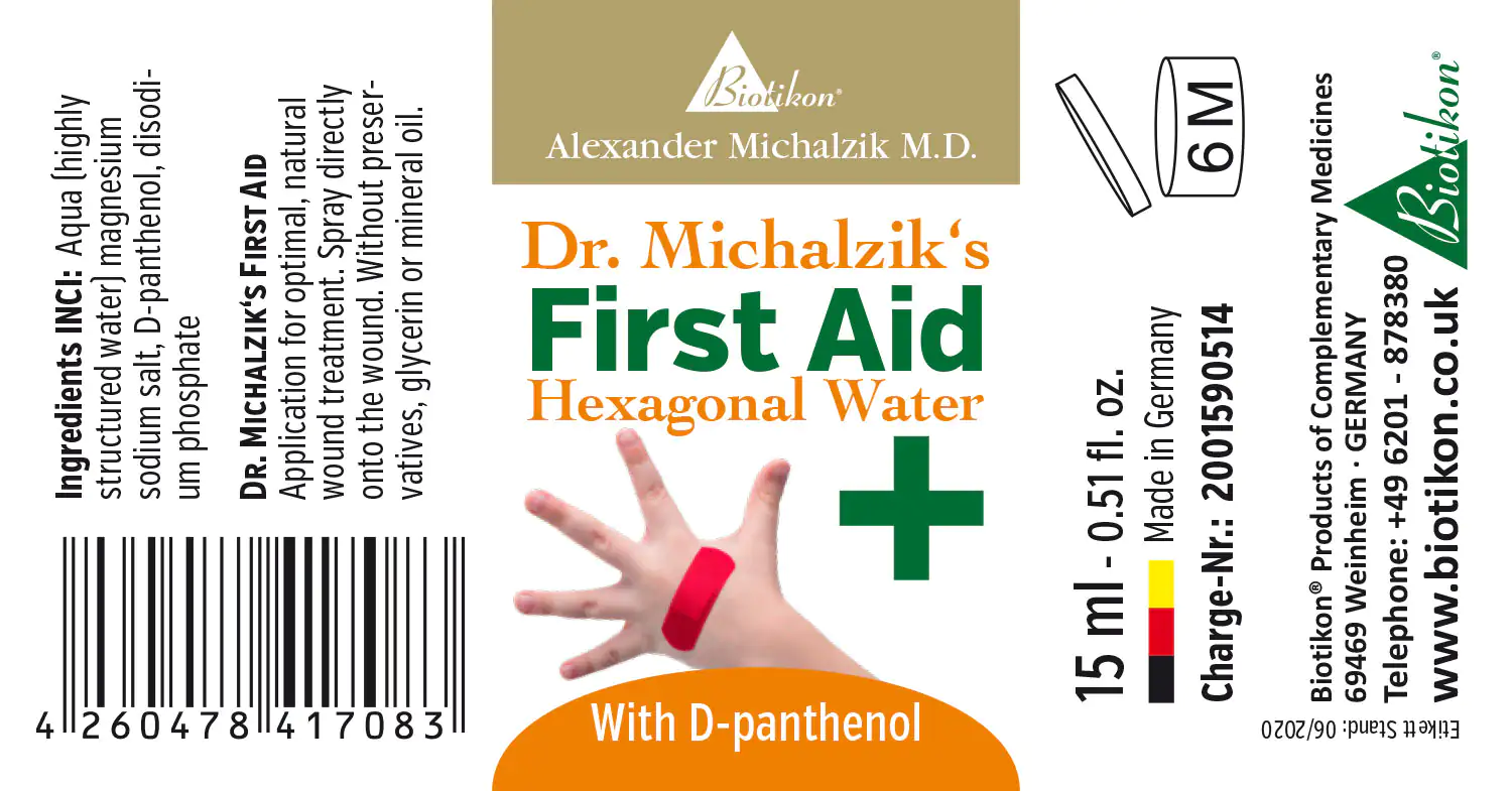 Hexagonal Water – 15 ml Spray 15 ml spray bottle of hexagonal water with D-Panthenol, shown on hand with a bandage.