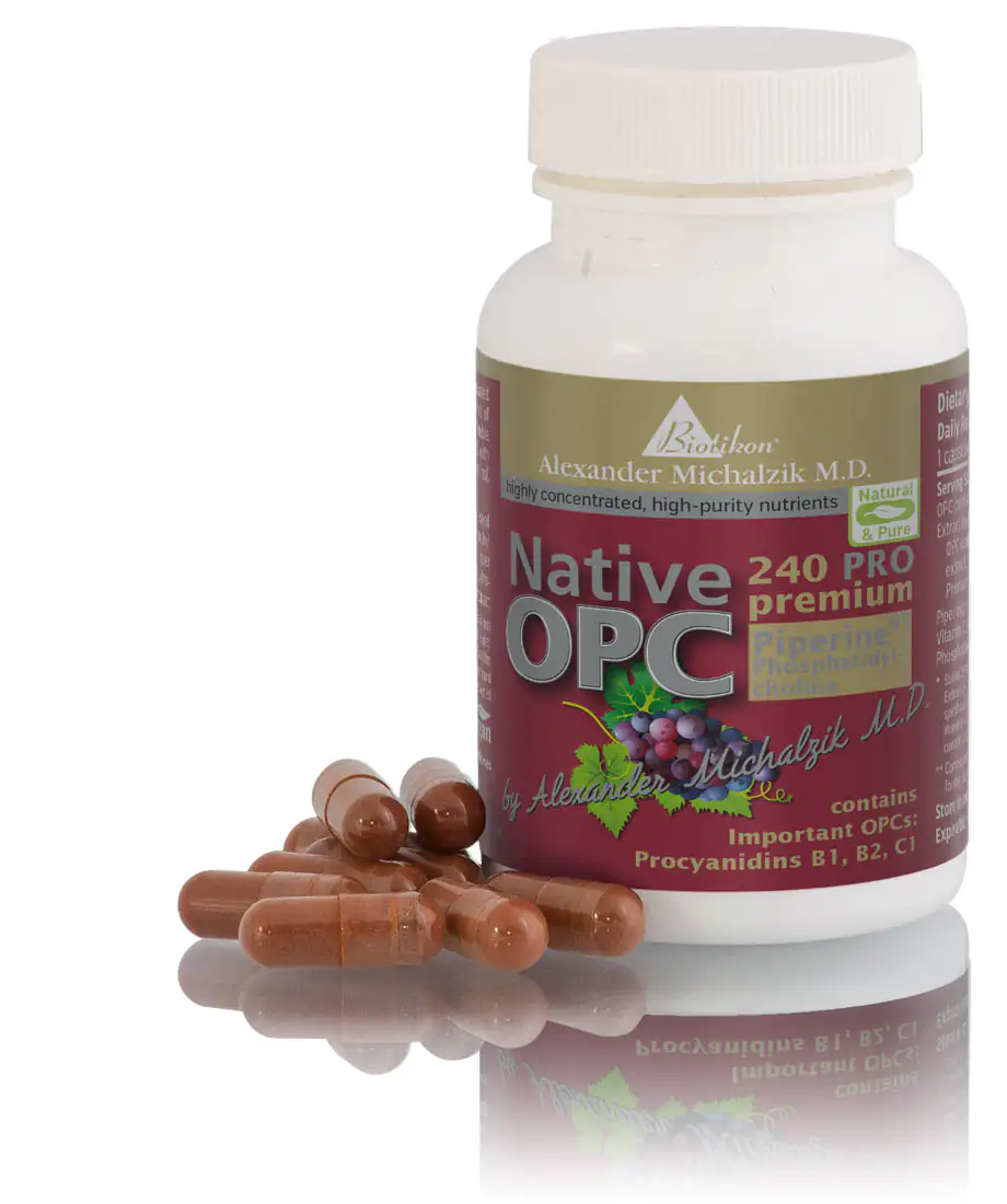 OPC 240 PRO – Capsules Brown capsules in a white bottle with a red label, 240 pieces, some capsules are in the foreground.