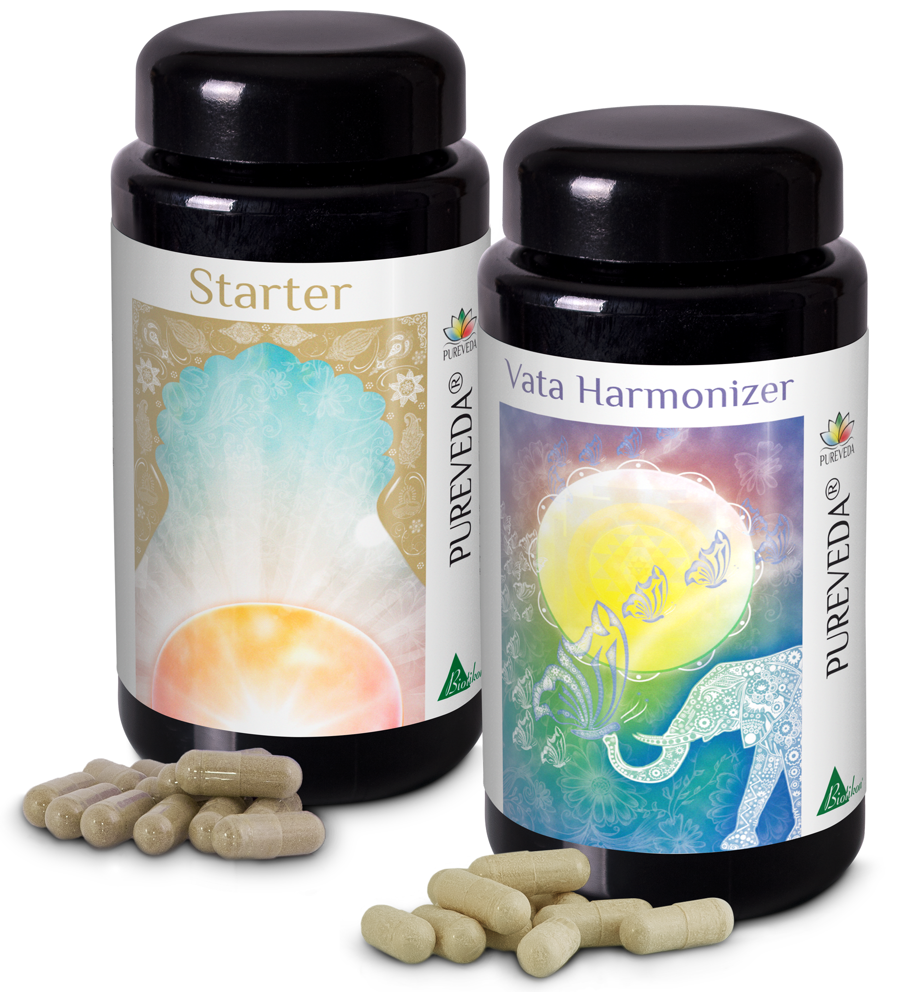 Ayurvedic Capsules - Starter & Vata Harmonizer Two black bottles of Ayurvedic capsules, Starter and Vata Harmonizer, with several capsules in the foreground.