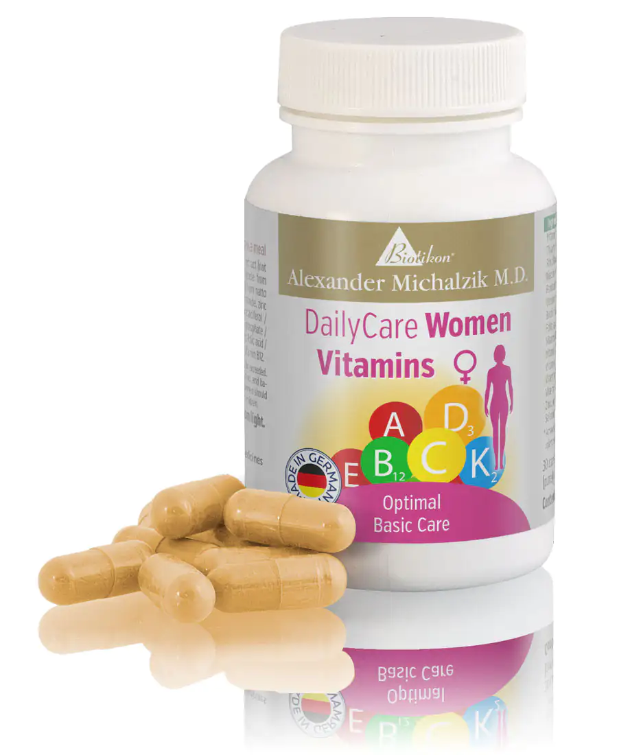 Women's Vital Nutrients - Capsules Bottle of women's vitamins, 30 capsules, yellowish, taken from a perspective view.